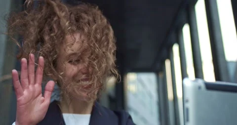 Charming curly haired office worker wearing a formal clothes near modern Stock Footage 137163116