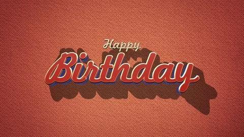 Charming fabric-cut letters spell out a joyous Happy Birthday message on a brown Stock Footage 293025848