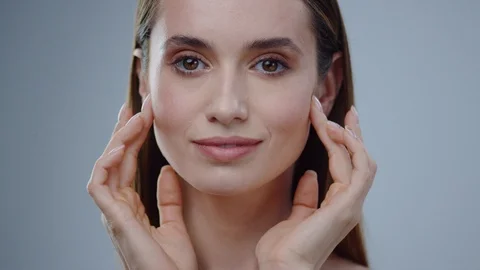 Charming face young naked woman look at | Stock Video | Pond5