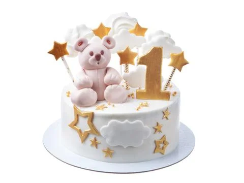 Charming first birthday cake featuring teddy bears and shiny embellishments Stock Photos