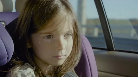 Charming girl spoiling and looking at camera Stock Footage 84876924