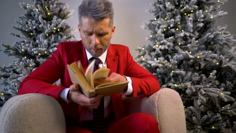 A charming guy is immersed in an interesting story. Video stock 167649731
