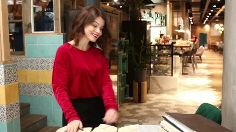 Charming hostess in restaurant Stock Footage 85499473