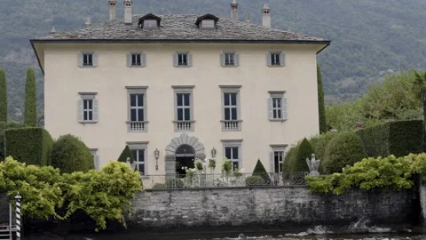 Charming Italian Villa Deeply Enveloped by Beautiful and Lush Natural Landscape Stock Footage 312072600
