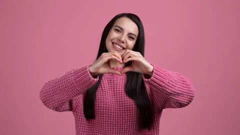 Charming lady make heart send air kiss isolated pastel color background Stock Footage 165862538