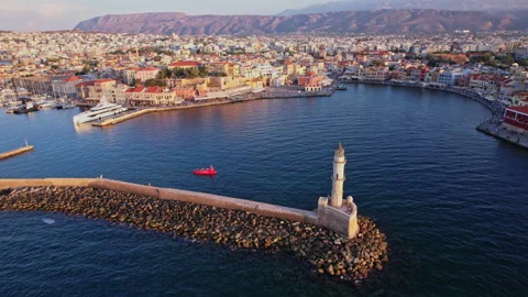 Charming lighthouse at sunset overlooking the harbor in Chania, Crete Stock Footage 287006648