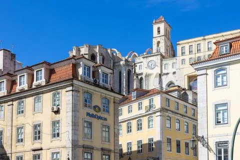 Charming lisbon architecture with clock tower Stock Photos