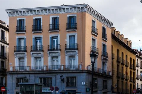 Charming Madrid architecture featuring elegant buildings with ornate balcon.. Stock Photos