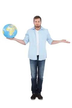 Charming model holding a globe and making faces Stock Photos