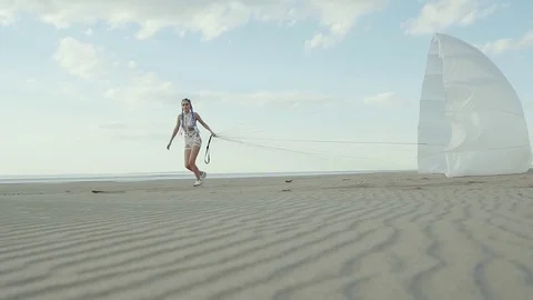 Charming model with a parachute. Video stock 84559073