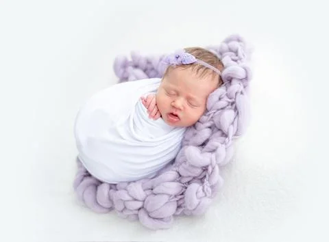 Charming newborn sleeping Stock Photos