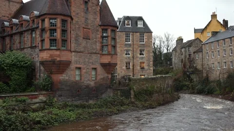 Charming old town and river in Scotland. Dean Village in Edinburgh on a Stock Footage 260221814