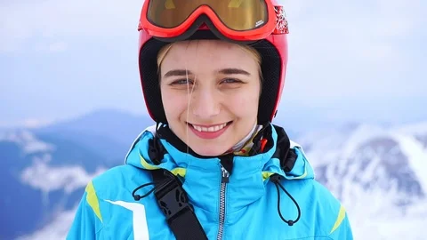 Charming portrait face smiling young caucasian woman feel happy skier climbs the Stock Footage 121066440