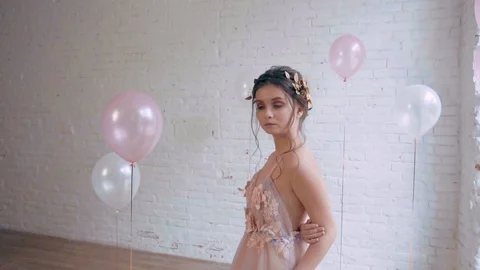 Charming princess in light dress in delicate pink and purple colors, neat Stock Footage 100193673