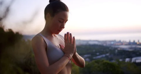 Charming profile side shot of healthy mixed race female practicing yoga pose Stock Footage 120945610