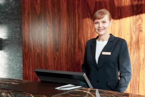 Charming receptionist at work Stock Photos