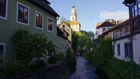 Charming Riverside View of Český Krumlov Castle at Sunset Stock Footage 313387738