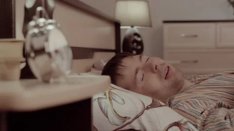 Charming sleeping man having a dream that becomes bad Stock-Footage 68429751