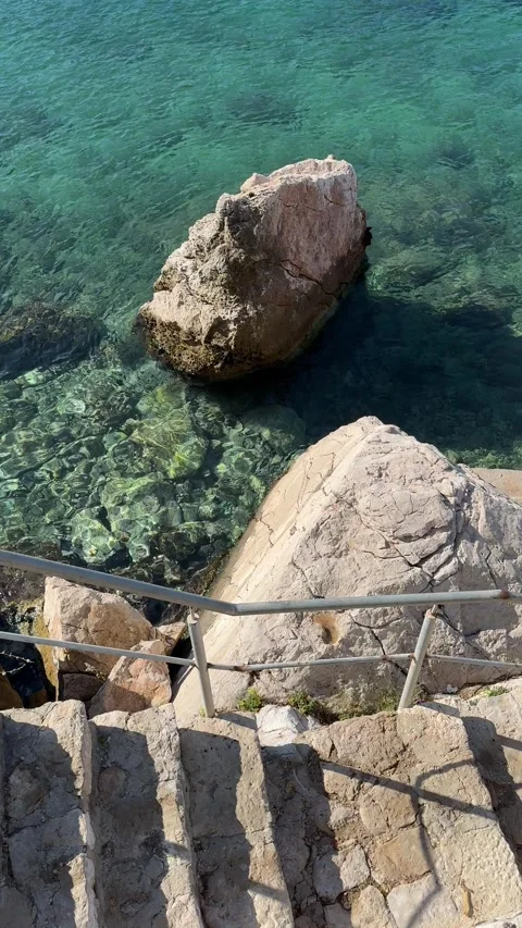 Charming stone staircase leading down to the sea in Croatia 스톡 동영상 319582839