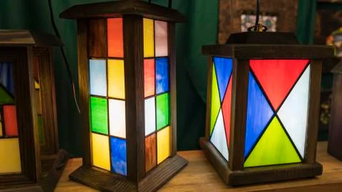 Charming table lamps in several different colors. Design of lighting fixtures Stock Photos