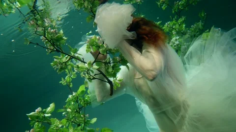 charming underwater princess is floating... | Stock Video | Pond5