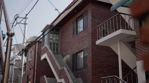 A Charming Urban Residence Featuring Distinctive Brick Architecture and Stock Footage 310241086