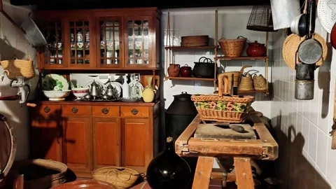 Charming Vintage Kitchen Interior Adorned with Traditional Utensils and Stock Footage 317058764