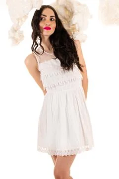 Charming woman in white dress Foto stock