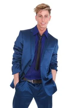 Charming young man posing in blue suit Stock Photos