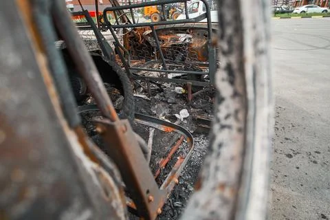 Charred Car Interior Inside Burned Delivery Van with Metal Seat Frames Stock-Fotos