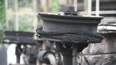 Charred vehicle which was reportedly set on fire by the protesters Video stock 122246285