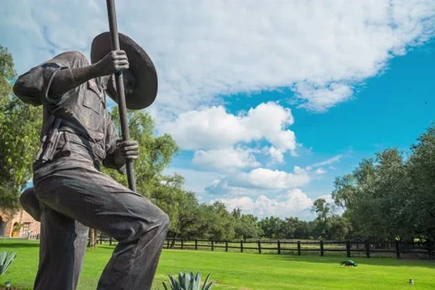 Charro statue with clouds &amp; blue sky timelapse. Full 20 mpx frame Stock Footage 205336480