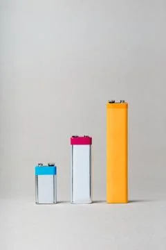 Chart bars created using used batteries displaying increase of batteries recy Stock Photos