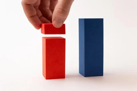 Chart from color blocks. Hand creates chart column. Stock Photos