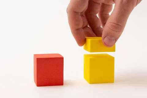 Chart from color blocks. Hand creates chart column. Stock Photos