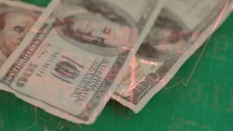Chart lines fluctuating on green felt, banknotes stacking and chips falling Stock Footage 318194359