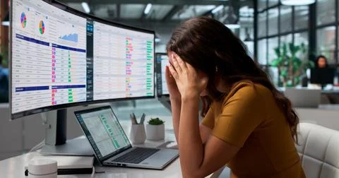 Chartered Accountant Struggles With Headache While Checking Financial Reports Stock Photos