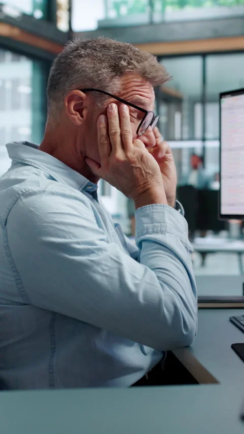 Chartered Accountant Tiredly Reviewing Complex Billing Codes Video stock 343884059