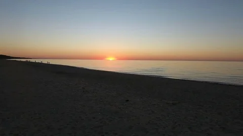 Chase sunset beach Stock Footage 69788520