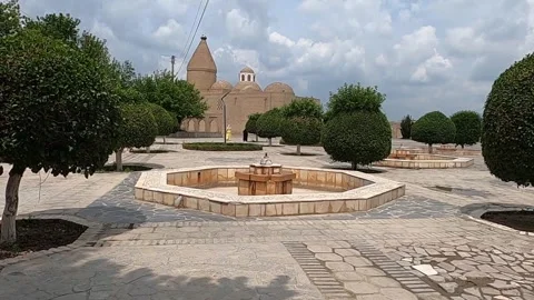 Chashma Ayub Mausoleum with conical dome and fountain square in Bukhara Stock Footage 336064232