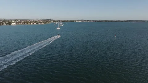 Chasing a boat with a drone Stock Footage 219208697