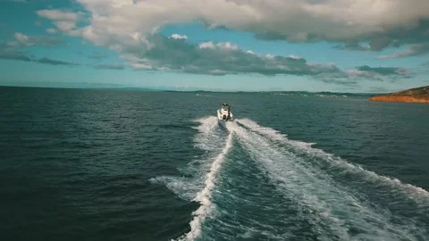 Chasing boat Stock Footage 236708356