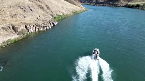 Chasing a boat Video stock 246869299