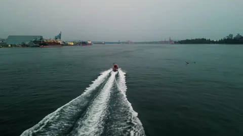 Chasing boat through Vancouver harbor 動画素材 248484240