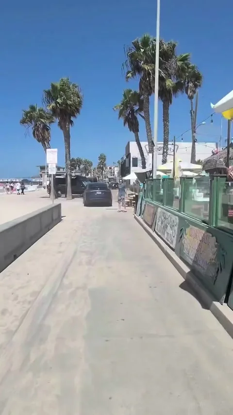Chasing Down a Fleeing Suspect After Driver Collides With Pedestrians at Pacific Stock Footage 345615563
