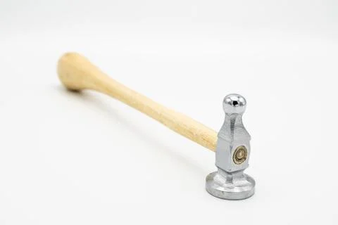 A chasing hammer lying on a white background Stock Photos