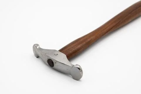A chasing hammer lying on a white background Stock Photos