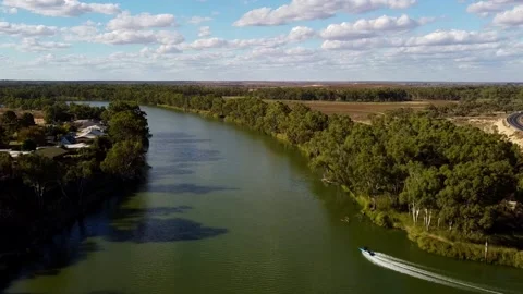 Chasing a speed boat on the river Stock Footage 308083434