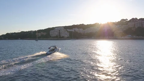 Chasing Speed boat in sunset with INSPIRE 2 drone. Stock Footage 101565873