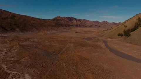 Chasing sunrise over the iconic Mount Bromo Stock Footage 304221445